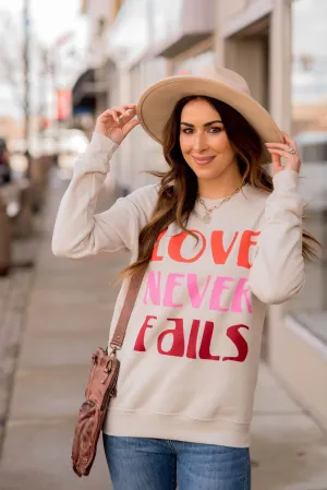 Love Never Fails Graphic Crewneck